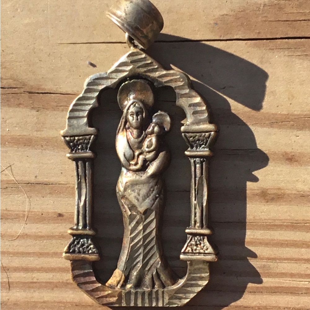 Vintage religious cast metal piece with Madonna and child